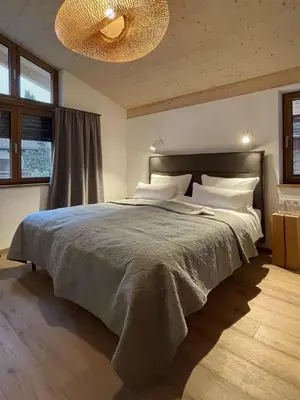 Ein Bett oder Betten in einem Zimmer der Unterkunft Ferienwohnung h9 Berg in Garmisch-Partenkirchen