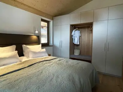 Ein Bett oder Betten in einem Zimmer der Unterkunft Ferienwohnung h9 Berg in Garmisch-Partenkirchen