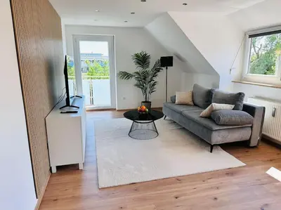 Ein Sitzbereich in der Unterkunft FeWo für 6 Personen WLAN Balkon Parken Stilvoll