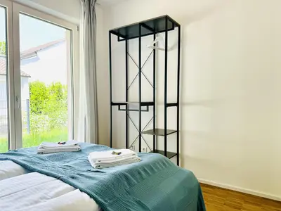 Ein Bett oder Betten in einem Zimmer der Unterkunft UNiQE - design Apartments - SKY-TV - Audi - free parking