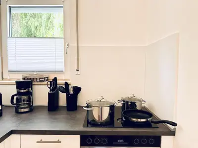 Küche/Küchenzeile in der Unterkunft UNiQE - design Apartments - SKY-TV - Audi - free parking