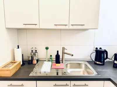 Küche/Küchenzeile in der Unterkunft UNiQE - design Apartments - SKY-TV - Audi - free parking