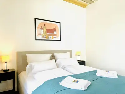Ein Bett oder Betten in einem Zimmer der Unterkunft UNiQE - design Apartments - SKY-TV - Audi - free parking