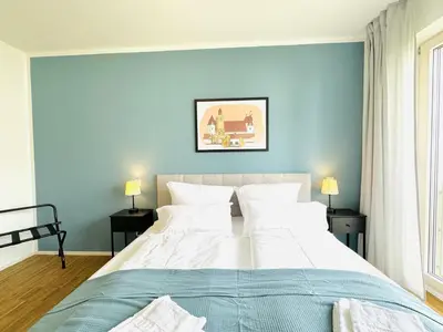 Ein Bett oder Betten in einem Zimmer der Unterkunft UNiQE - design Apartments - SKY-TV - Audi - free parking