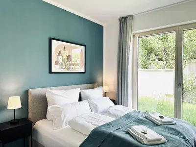 Ein Bett oder Betten in einem Zimmer der Unterkunft UNiQE - design Apartments - SKY-TV - Audi - free parking