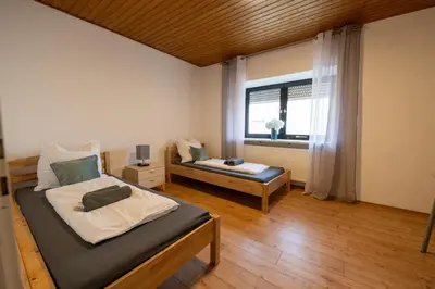 Ein Bett oder Betten in einem Zimmer der Unterkunft Ferienhaus am Grünen Bug