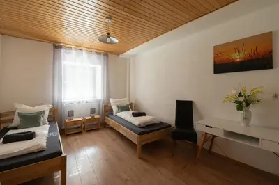 Ein Bett oder Betten in einem Zimmer der Unterkunft Ferienhaus am Grünen Bug