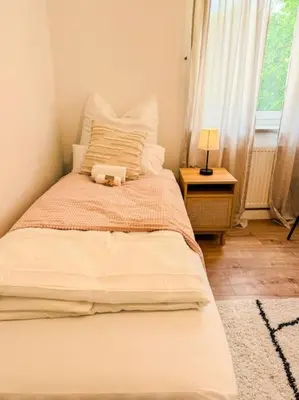 Ein Bett oder Betten in einem Zimmer der Unterkunft City-Apartment - private parking