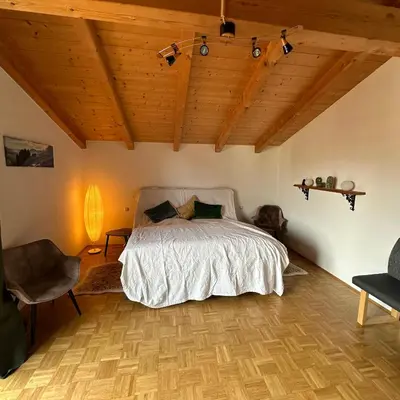 Ein Bett oder Betten in einem Zimmer der Unterkunft Alpen View