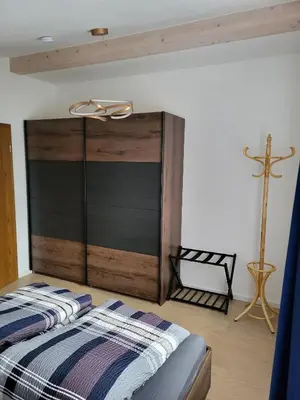 Ein Bett oder Betten in einem Zimmer der Unterkunft Ferienwohnung Neubauer