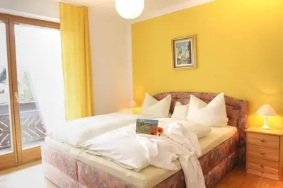 Ein Bett oder Betten in einem Zimmer der Unterkunft Ferienwohnung Genzinger