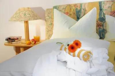 Ein Bett oder Betten in einem Zimmer der Unterkunft Ferienwohnung Genzinger