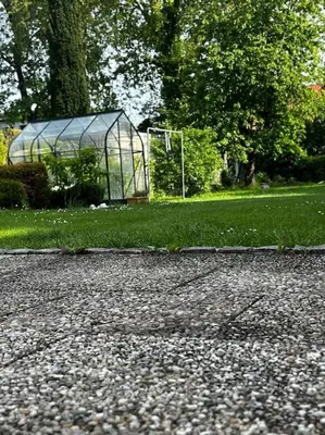 Ein Garten an der Unterkunft Ammersee Garten Appartment