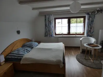 Ein Bett oder Betten in einem Zimmer der Unterkunft Nähe München - hell, zentral, ruhig, flughafennah