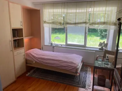 Ein Bett oder Betten in einem Zimmer der Unterkunft Landhaus in Dießen am Ammersee