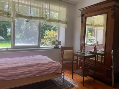 Ein Bett oder Betten in einem Zimmer der Unterkunft Landhaus in Dießen am Ammersee