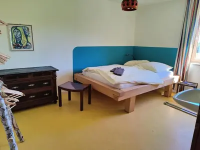 Ein Bett oder Betten in einem Zimmer der Unterkunft große Wohnung mit Dachterrasse