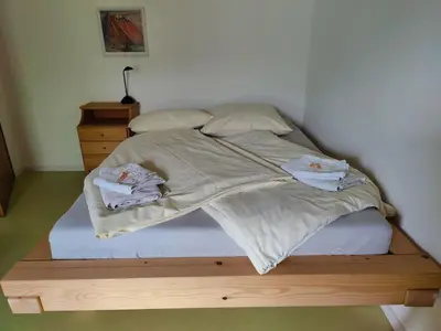 Ein Bett oder Betten in einem Zimmer der Unterkunft große Wohnung mit Dachterrasse