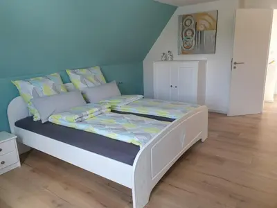 Ein Bett oder Betten in einem Zimmer der Unterkunft Ferienhaus in der Schwaighofstrasse