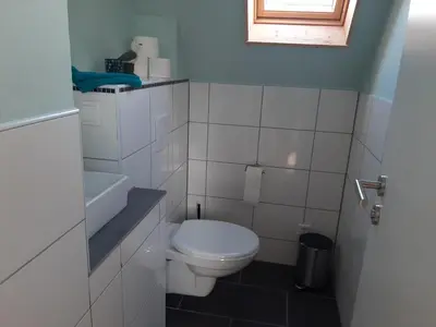 Ein Badezimmer in der Unterkunft Ferienhaus in der Schwaighofstrasse