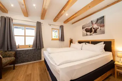 Ein Bett oder Betten in einem Zimmer der Unterkunft Alpenherz
