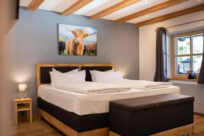 Ein Bett oder Betten in einem Zimmer der Unterkunft Alpenherz
