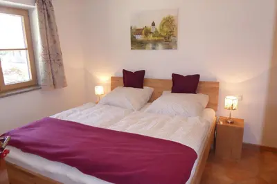 Ein Bett oder Betten in einem Zimmer der Unterkunft Ferienwohnungen Florian Pletzenauer