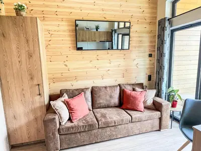 Ein Sitzbereich in der Unterkunft Holiday Home Tiny Haus Glockenalm - Sunny Place by Interhome