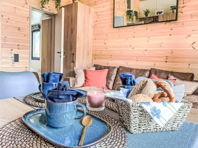 Ein Sitzbereich in der Unterkunft Holiday Home Tiny Haus Glockenalm-Haus Spitzingsee by Interhome