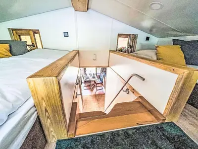 Ein Bett oder Betten in einem Zimmer der Unterkunft Holiday Home Tiny Haus Glockenalm-Haus Spitzingsee by Interhome