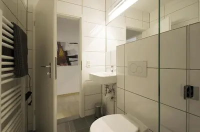 Ein Badezimmer in der Unterkunft Bohemian Residency, Central and Quiet