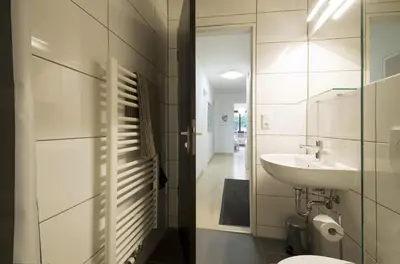 Ein Badezimmer in der Unterkunft Bohemian Residency, Central and Quiet