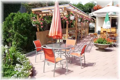Ein Garten an der Unterkunft Gästehaus Hubertus