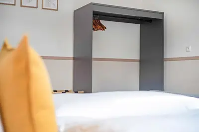 Ein Bett oder Betten in einem Zimmer der Unterkunft Cozy Apartment
