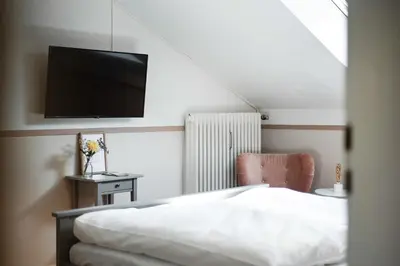 Ein Bett oder Betten in einem Zimmer der Unterkunft Cozy Apartment