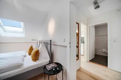 Ein Bett oder Betten in einem Zimmer der Unterkunft Cozy Apartment