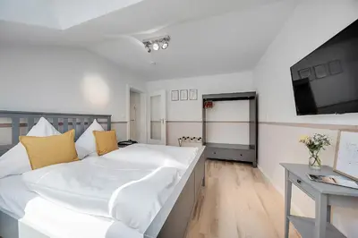 Ein Bett oder Betten in einem Zimmer der Unterkunft Cozy Apartment