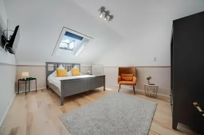Ein Bett oder Betten in einem Zimmer der Unterkunft Chiemsee Apartment