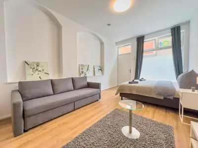 Ein Sitzbereich in der Unterkunft Moderne Wohnung im Zentrum der Altstadt - Altbau Flair, WLAN