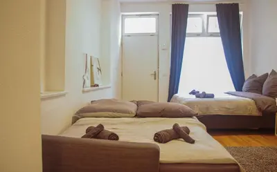 Ein Bett oder Betten in einem Zimmer der Unterkunft Moderne Wohnung im Zentrum der Altstadt - Altbau Flair, WLAN