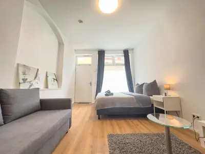 Ein Sitzbereich in der Unterkunft Moderne Wohnung im Zentrum der Altstadt - Altbau Flair, WLAN