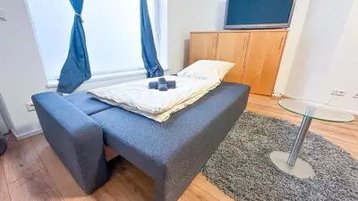 Ein Bett oder Betten in einem Zimmer der Unterkunft Moderne Wohnung im Zentrum der Altstadt - Altbau Flair, WLAN