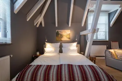 Ein Bett oder Betten in einem Zimmer der Unterkunft Remise Possenhofen