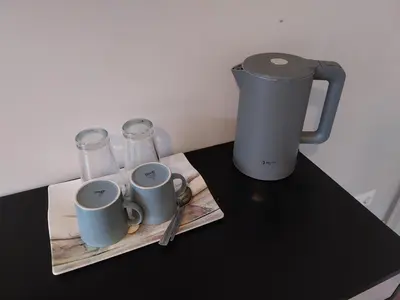 Kaffee-/Teezubehör in der Unterkunft Bad Aibling City Apartment Zimmer