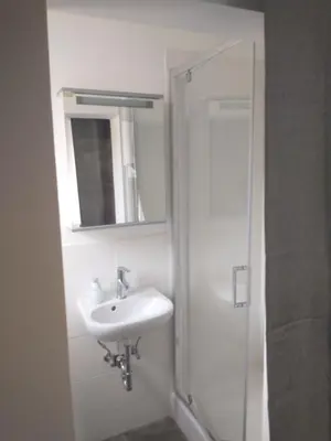 Ein Badezimmer in der Unterkunft Bad Aibling City Apartment Zimmer