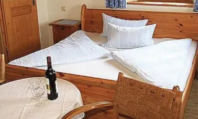 Ein Bett oder Betten in einem Zimmer der Unterkunft Buchnerhof Urlaub auf dem Bauernhof