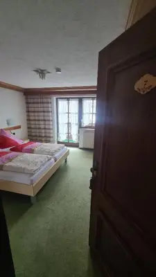 Ein Bett oder Betten in einem Zimmer der Unterkunft Pension Christophorus