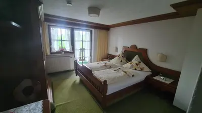 Ein Bett oder Betten in einem Zimmer der Unterkunft Pension Christophorus