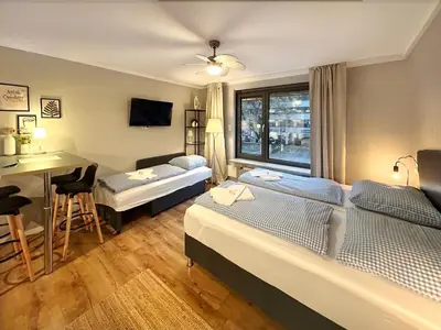 Ein Bett oder Betten in einem Zimmer der Unterkunft Cozy apartment in city center