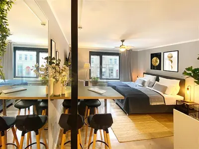 Ein Bett oder Betten in einem Zimmer der Unterkunft Cozy apartment in city center
